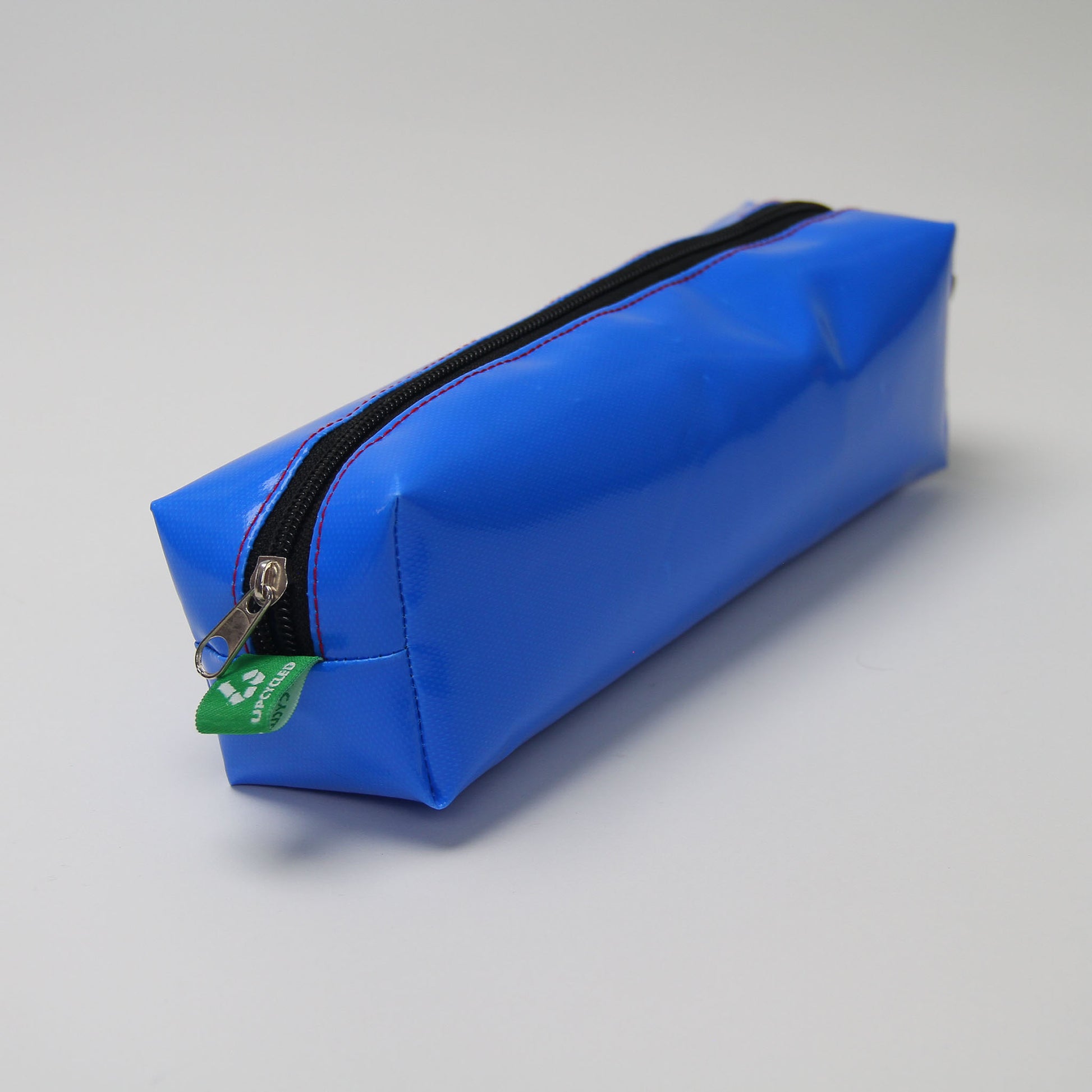 🌟 XL Bold Accessory Bag - Your Ultimate Companion!  Repurposed billboards, durable tarpulin.  Makeup, pencil, cable, accessory organizer.  Sustainable, durable, versatile.  Make a statement with sustainability! 🌿💼✨  Shop now! 💚👜 #SustainableLiving #UpcycledFashion