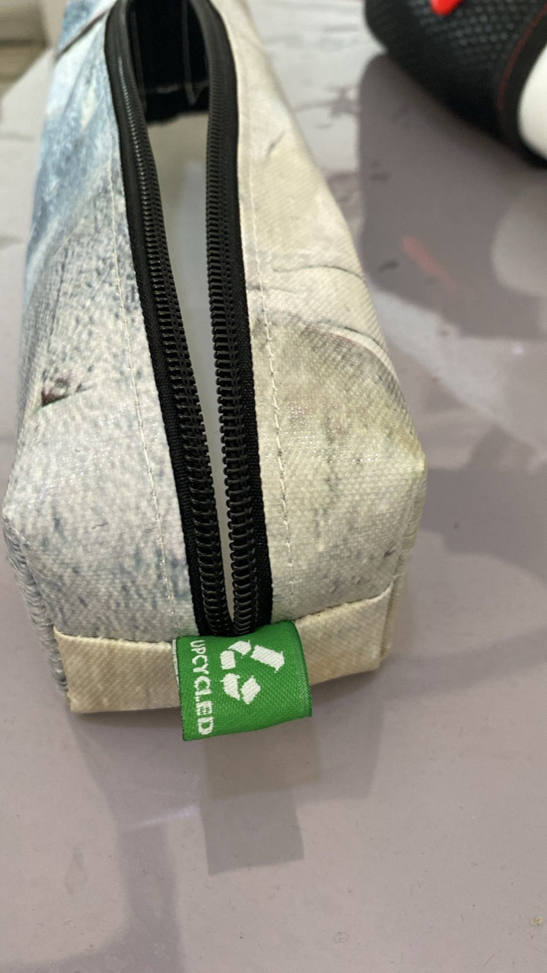 Final detail — upcycled label, sewn in