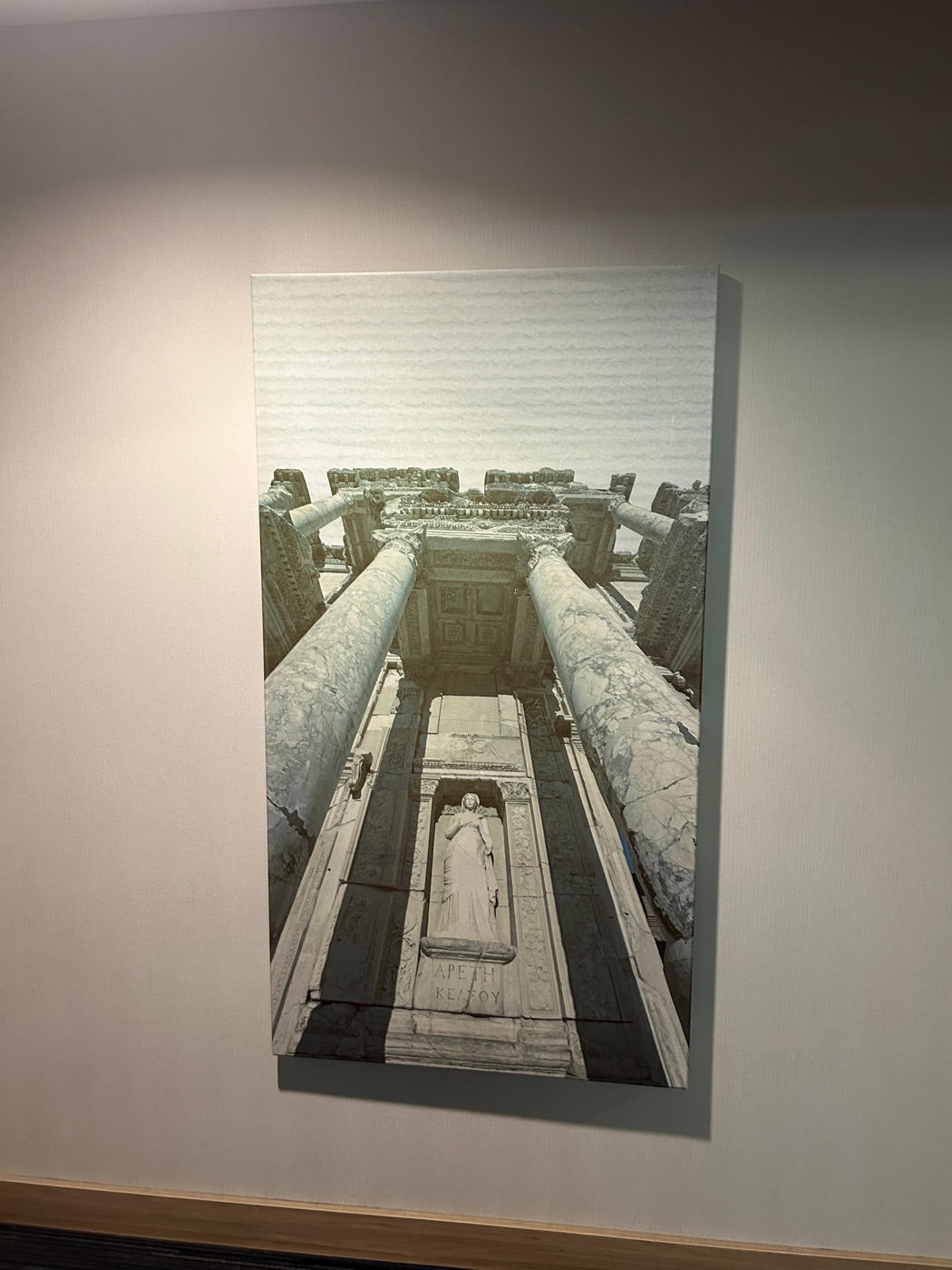 Raw material — retired Ephesus canvas art, still on the hotel wall